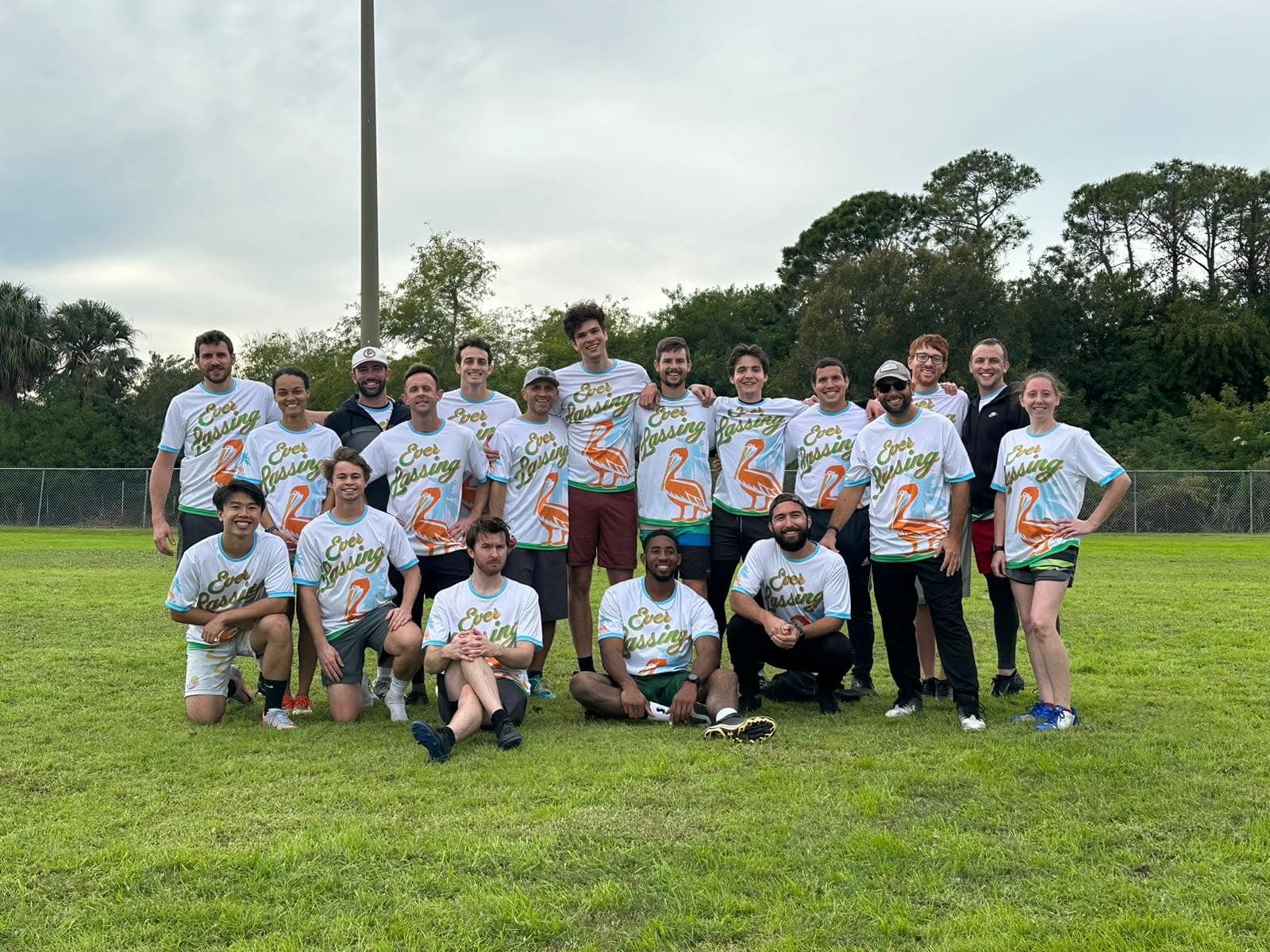 The Ever Lassing Ultimate Frisbee team gathered on a field
