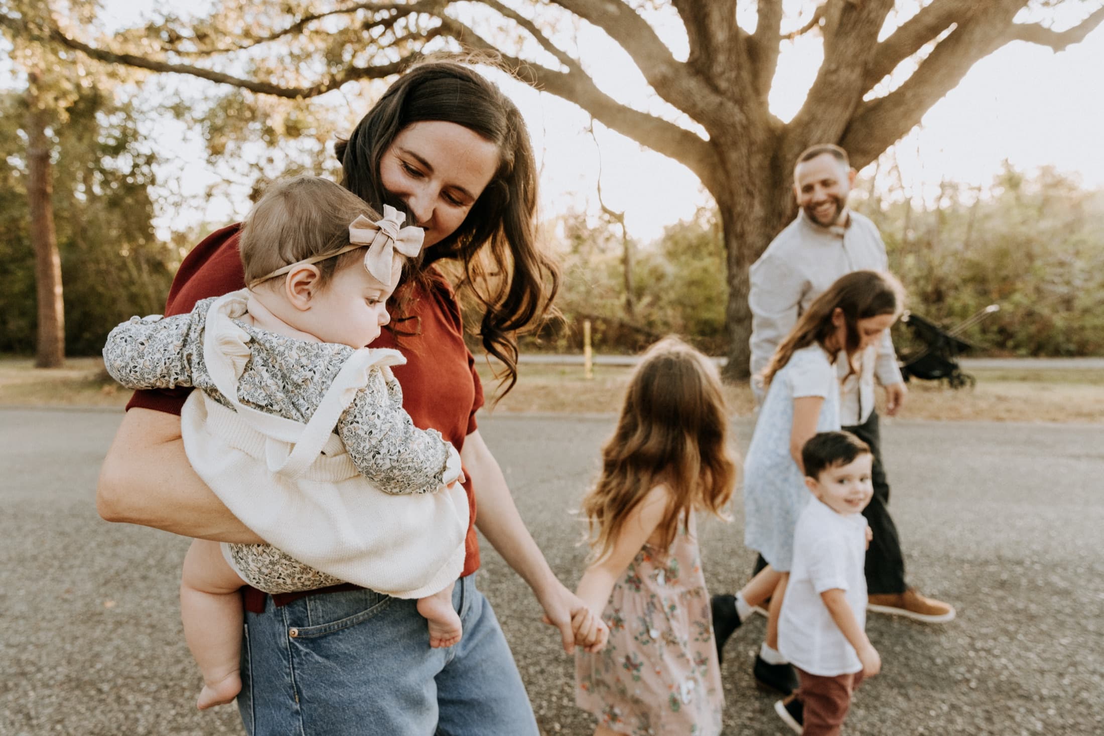 Kason Kedersha with his wife Brittany and their four children outdoors
